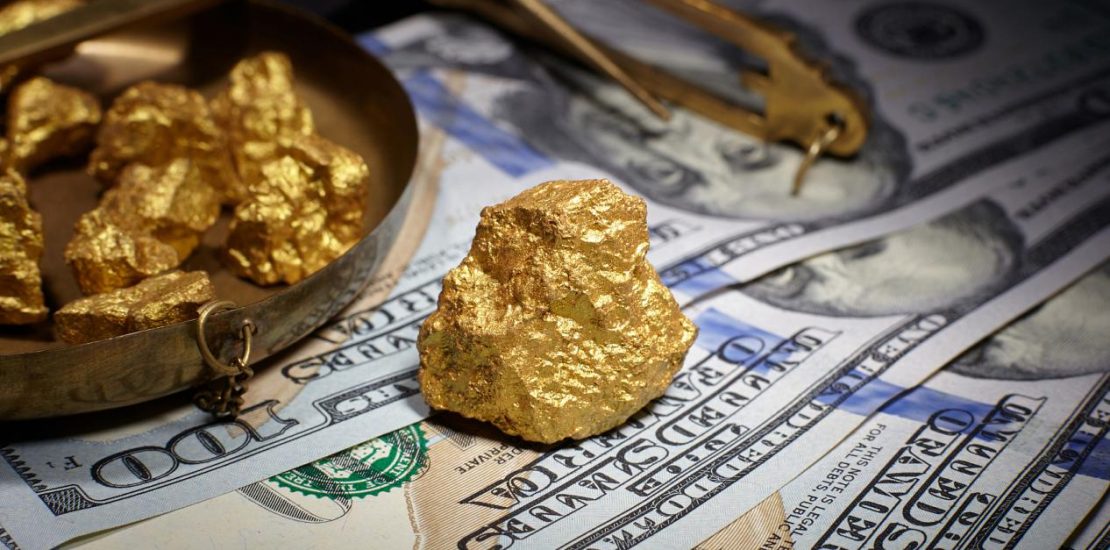 mound gold and dollar bills