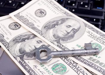 Dollars on the laptop keyboard