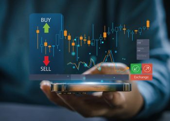 交易者成功使用电话交易股票交易所图币、全球经济、交易者投资者、区块链股票市场加密货币买卖图币和价格图表数据图