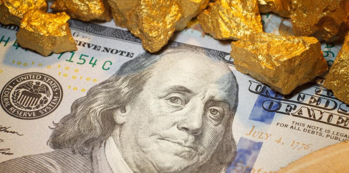 mound gold and dollar bill