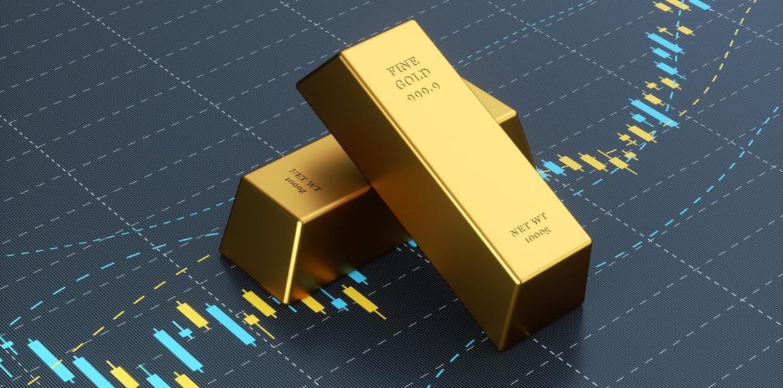 坐在蓝色条形图上的金条，股票市场和金融概念。position_newest_0_resourcebtn&